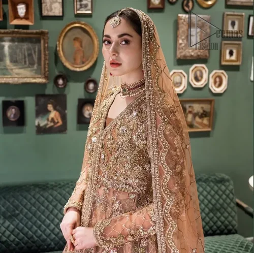 It is coordinated with lehenga and dupatta having small motifs all over.