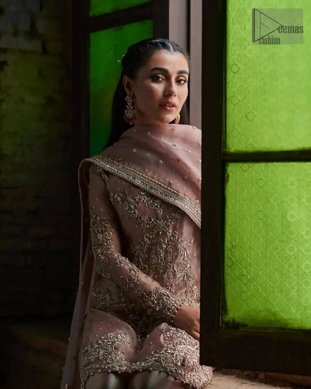 Crafted from the finest fabrics, it is organized with border embellished sharara that gives you grace as you exchange your vows.