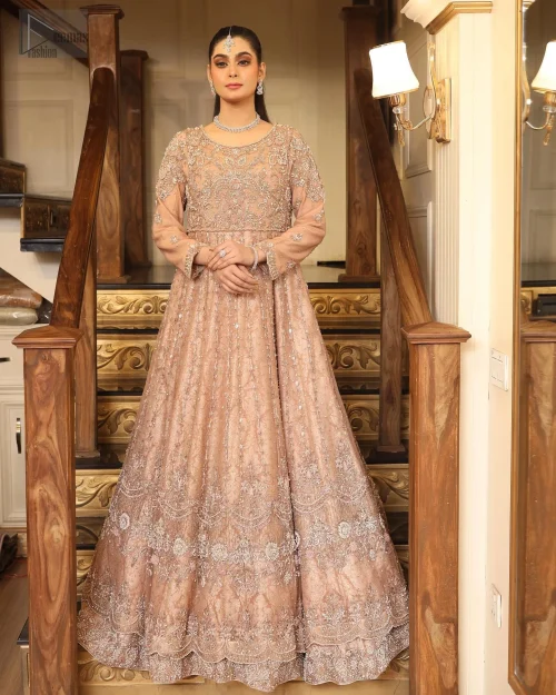 Crafted from ethereal organza, this lehenga is an enchanting blend of tradition and romance, perfect for your Nikah.