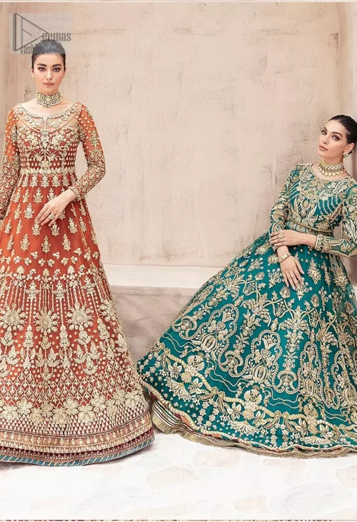 The rich rust hue, paired with an embellished bodice and intricate golden embroidery, creates a look that is both bold