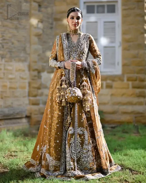 Regal copper ensemble with full-sleeve maxi and shimmering silver threadwork, timeless mehndi elegance