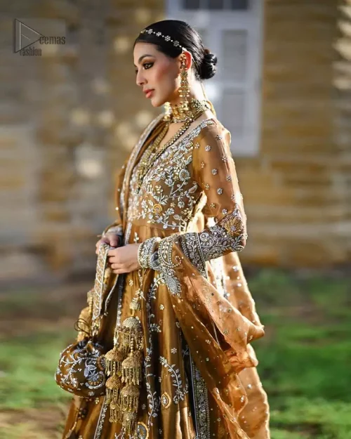 Graceful organza maxi in rich copper tones with intricate embroidery, heritage reimagined