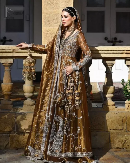 Majestic copper attire with sequined dupatta and classic round neckline, a poetic mehndi dream
