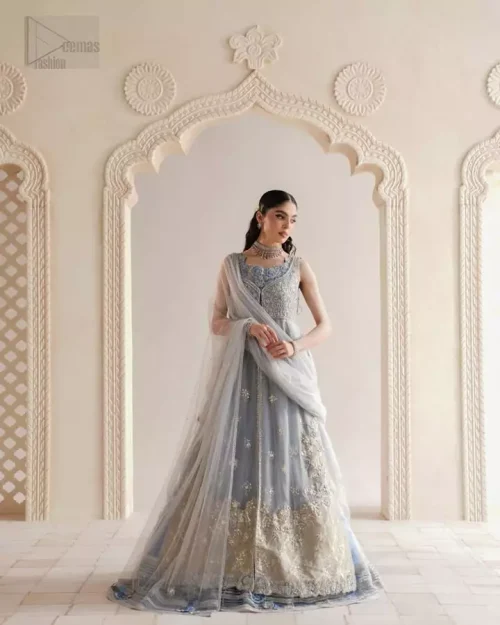 Elegant front-open gown in icy hues paired with a luminous embroidered maxi