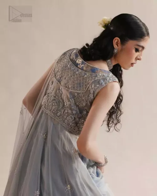 Luxe ice blue formal set with airy organza textures and radiant embellishments