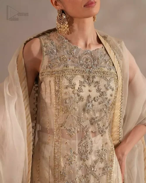 Ethereal ivory long shirt with graceful side slits flowing over a regal sharara silhouette