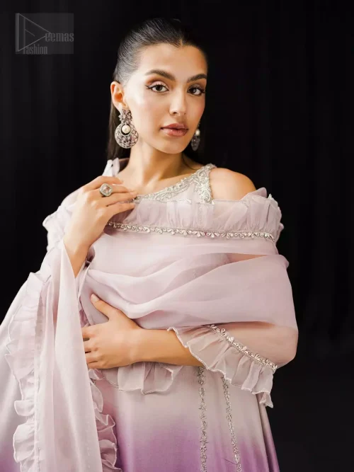 Contemporary lavender and mauve ensemble with frilled A-line shirt, silver detailing, and pure katan organza dupatta.