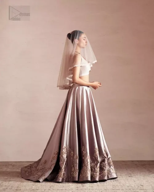 The showstopping detail: a dramatic back train on the lehenga.