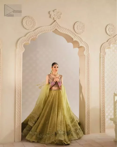 Luxury Embellishments: Zoom-in on the hand-crafted details including Swarovski crystals, pearls, and beads integrated into the pink tissue fabric.