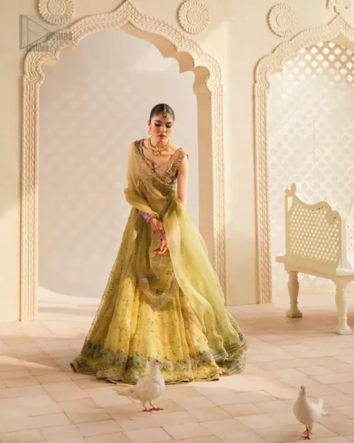 Full Mehndi Ensemble: Full-length view of the Pink Blouse and Lime Green Lehenga, a vibrant and graceful choice for a