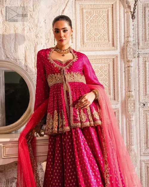 Hemline Embellishment: High-definition view of the heavily embellished lehenga hemline with Dabka, pearls, and Swarovski crystals.