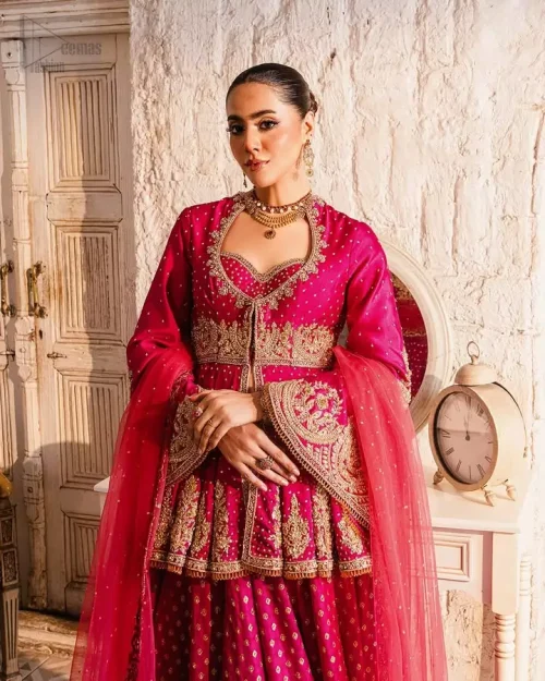 Full Ensemble View: Front view of the Raspberry Front Open Peplum Lehenga, a charming raw silk outfit for receptions and