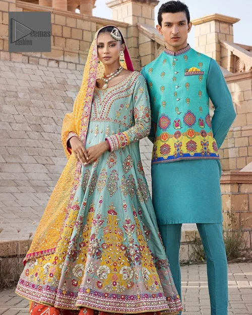 Effortlessly achieve the perfect bride look with this mehndi wear! Turquoise Frock is adorned with gorgeous motifs in multiple colors.
